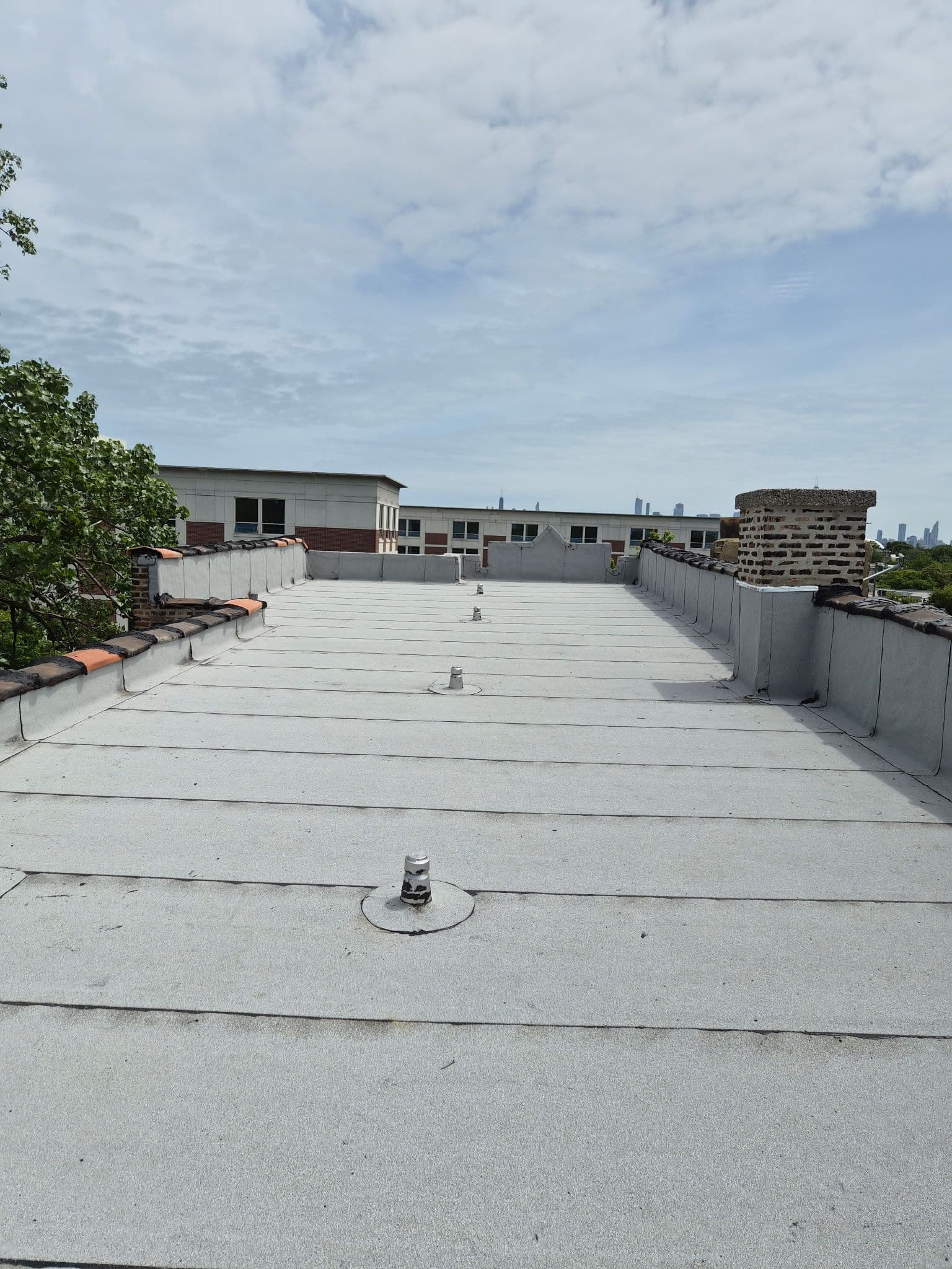 Project Chicago Flat Roof Tear-Off and GAF Modified Replacement image
