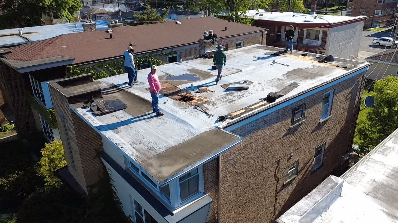 Gallery photos for Flat Roof Tear-Off and Tapered Deck Re-Roof in Forest Park: Image #1
