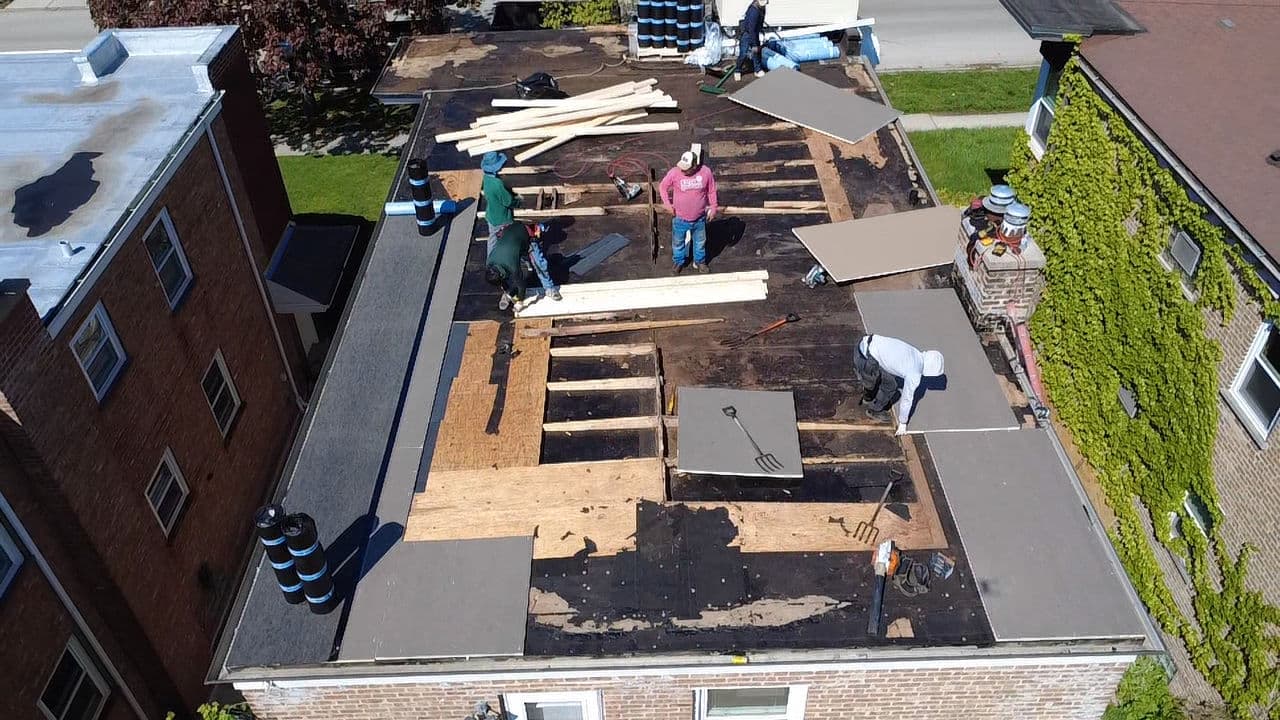 Gallery photos for Flat Roof Tear-Off and Tapered Deck Re-Roof in Forest Park: Image #2