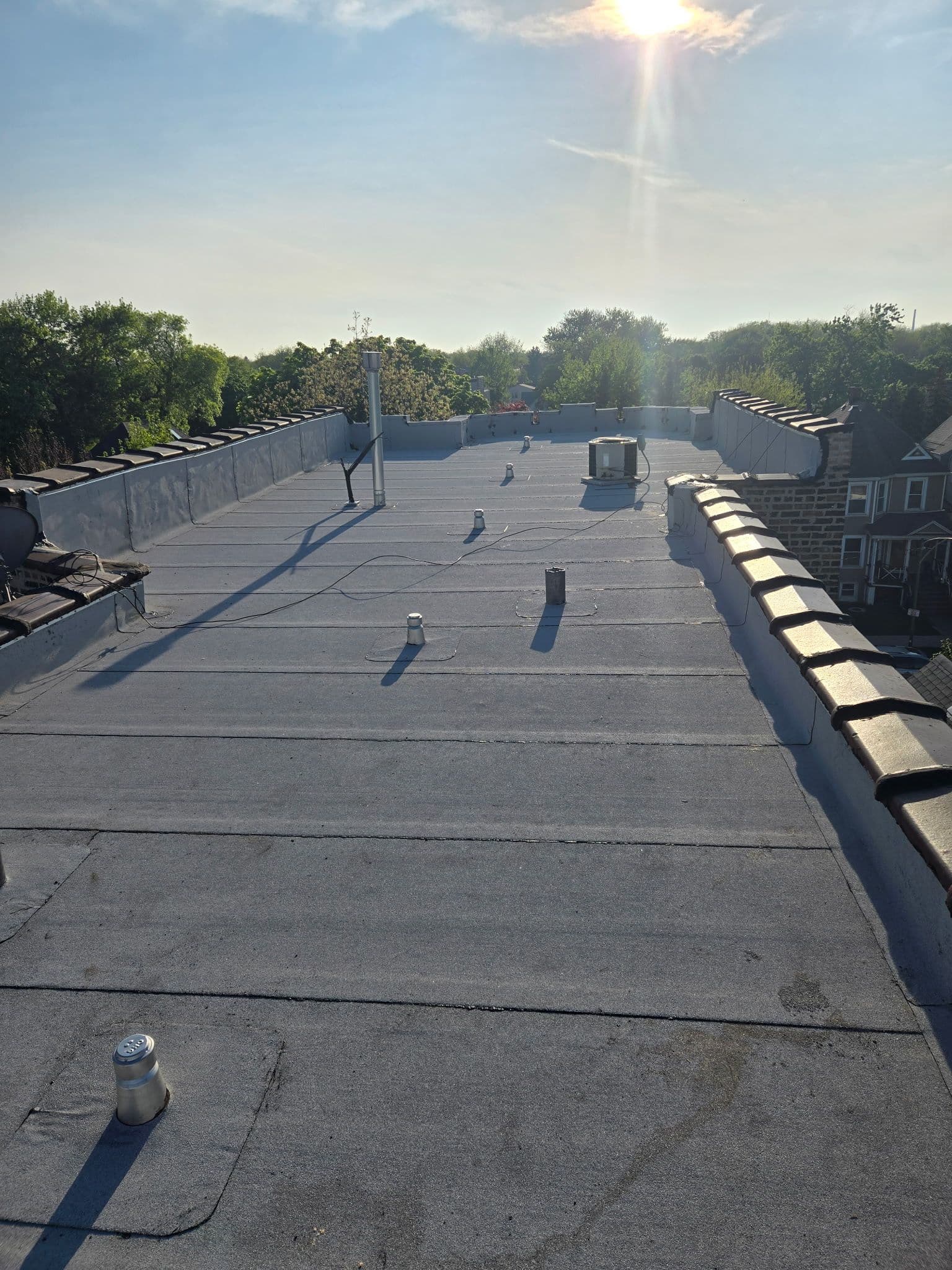Gallery photos for Flat Roof Replacement Done Right - Tear-Off to Finished Modified System: Image #1